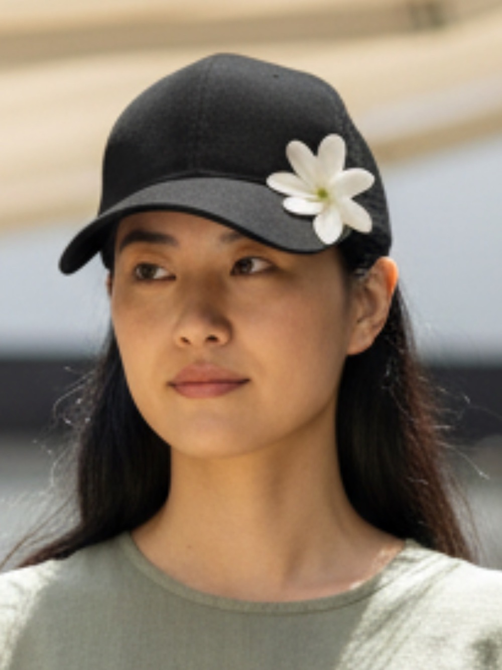 Black trucker hat with Tiare flower Hawaiian Hawaii
